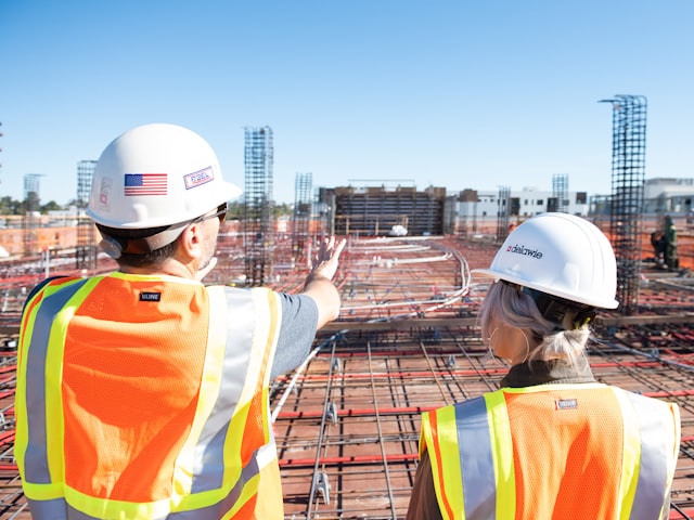 Branded corporate uniforms on display for a construction company