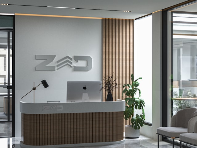 Illuminated office reception signage with company logo